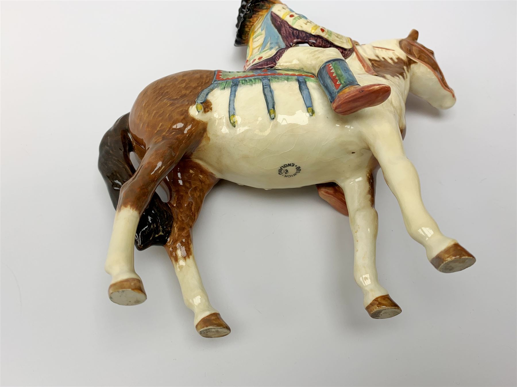 A Beswick Native American on horseback, with printed mark beneath, H21.5cm. 