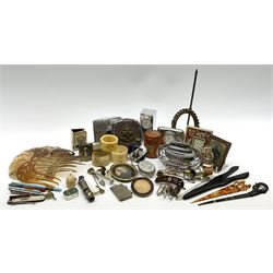 A group of assorted collectables, to include small oval purple guilloche enamel frame, WWII matchbox holder depicting Winston Churchill, Halcyon Days enamel box, Ronson table lighter, ebonised glove stretchers, ivory napkin ring, mother of pearl handled button hook, engine turned cigarette case, etc. 