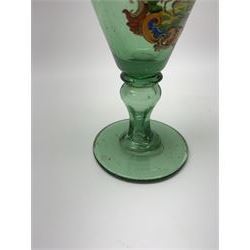 19th century bohemian green glass wine glass, the funnel bowl decorated in enamells with a Historismus hunting scene in the manner of Egermann & Lobmeyr, upon a baluster stem and circular foot, H14.5cm