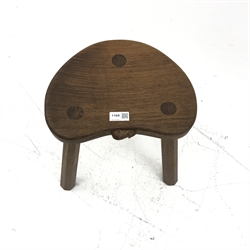 'Mouseman' oak three legged stool, dished adzed seat by Robert Thompson of Kilburn, H35cm, W31cm