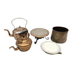 Quantity of copper to include ceramic warming plate, circular stand with three cast iron scrolled feet, jardiniere decorated with animals and foliate design and two kettles (5)