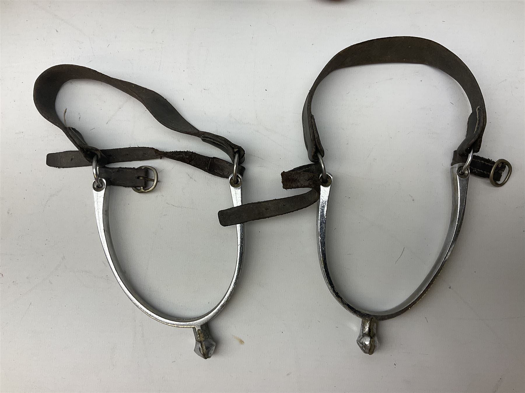 Miscellaneous items including two native ceremonial maces; steel spear head; pair of chrome plated spurs by Geo. Parker & Sons; WW1 French & Son marching compass leather case; scissor action bullet mould etc