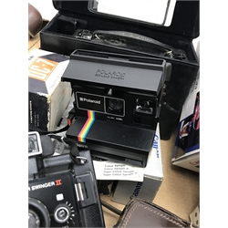 Large quantity of camera equipment in three boxes - Panasonic ZOOM C-900ZM 35mm camera, PENTAX sportmatic camera, RICOH 500 ME camera, Canon EOS 500N camera and lens boxed, Voigtlander VITO CLR camera, MAMIYA 16 camera, KODAK SIX-20 Junior, Minolta RIVA zoom 105i camera, PETRI 7 S camera, KODAK Duo 620 camera, Polaroid 600 Land Camera Spirit, auto teleplus 2x converter, Prinzflex auto 1:2.8, CANON zoom lens 80-200mm, various other cameras, lenses and cases