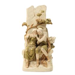 Royal Dux figure of seated male and female figures drinking by a well with gilded decoration H37cm