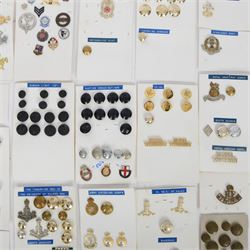 Collection of military cap badges, buttons and similar, including examples for Royal Army Medical Corps, Royal Army Pay Corps, Royal Engineers etc 