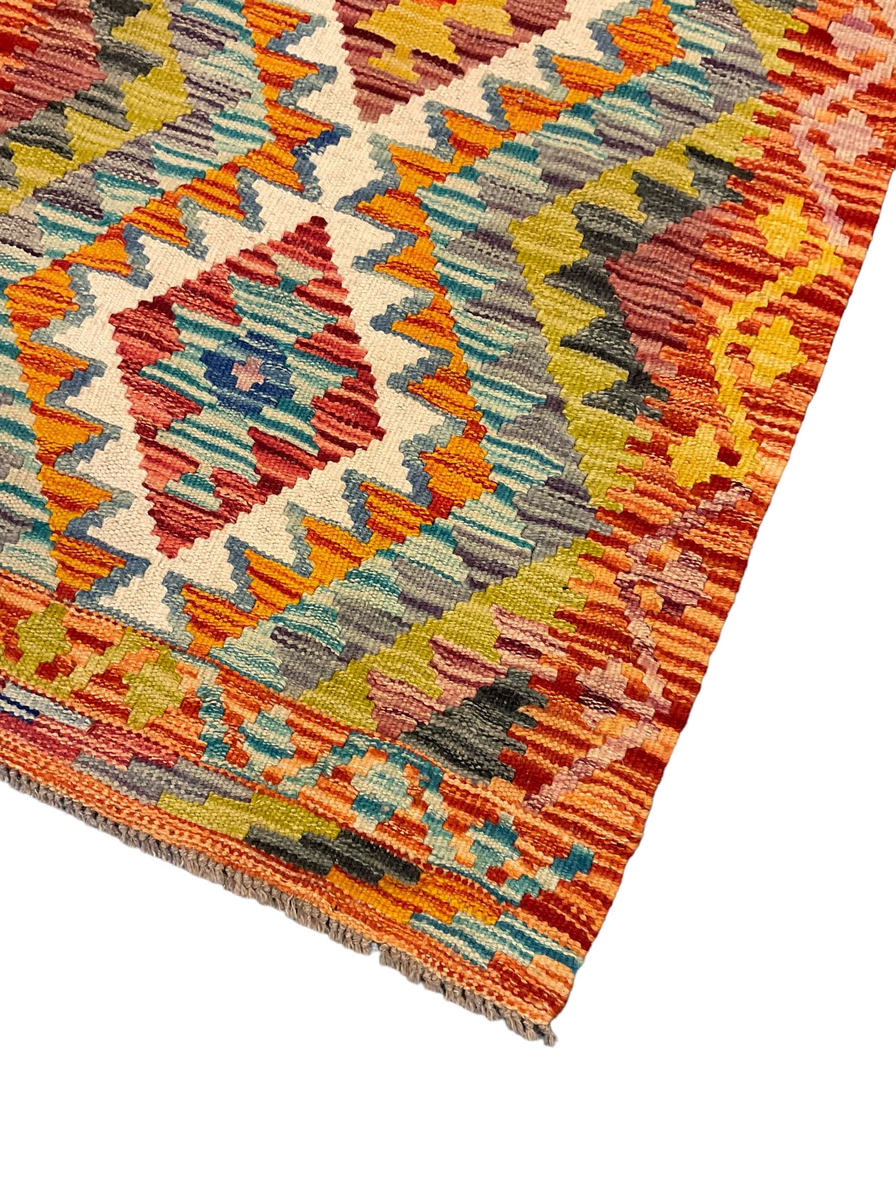 Chobi Kilim multi-coloured ground geometric design rug