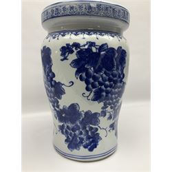Oriental style blue and white ceramic garden seat, decorated with fruiting vines, H40.6cm