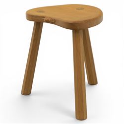 Mouseman - oak three legged calf stool, with carved mouse signature, by the workshop of Robert Thompson of Kilburn