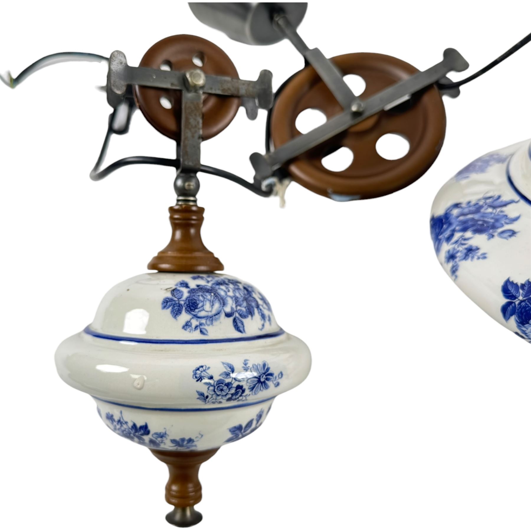 Ceramic ceiling light, with weighted pully system, the ceramic shade and weights decorated with roses