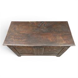 18th century oak coffer with carved frieze and rails, rectangular plank top with iron strap hinges, raised on stile supports