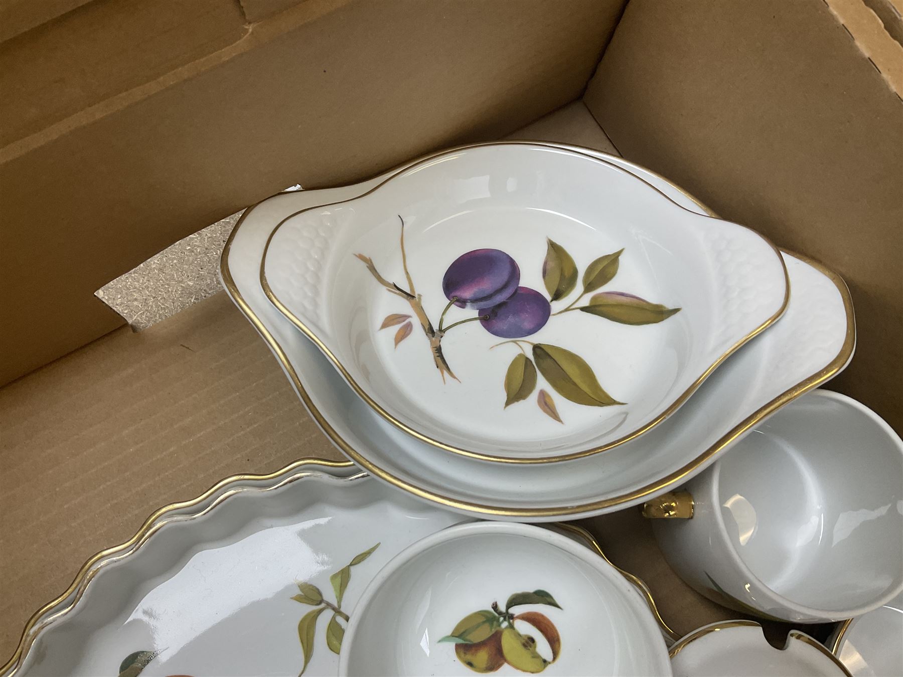 Royal Worcester Evesham and Evesham Vale tea and dinner wares, to include, three large covered tureens, coffee pot, eight tea cups and saucers, milk jug, two covered sucriers, boxed serving spoons etc, approx .130