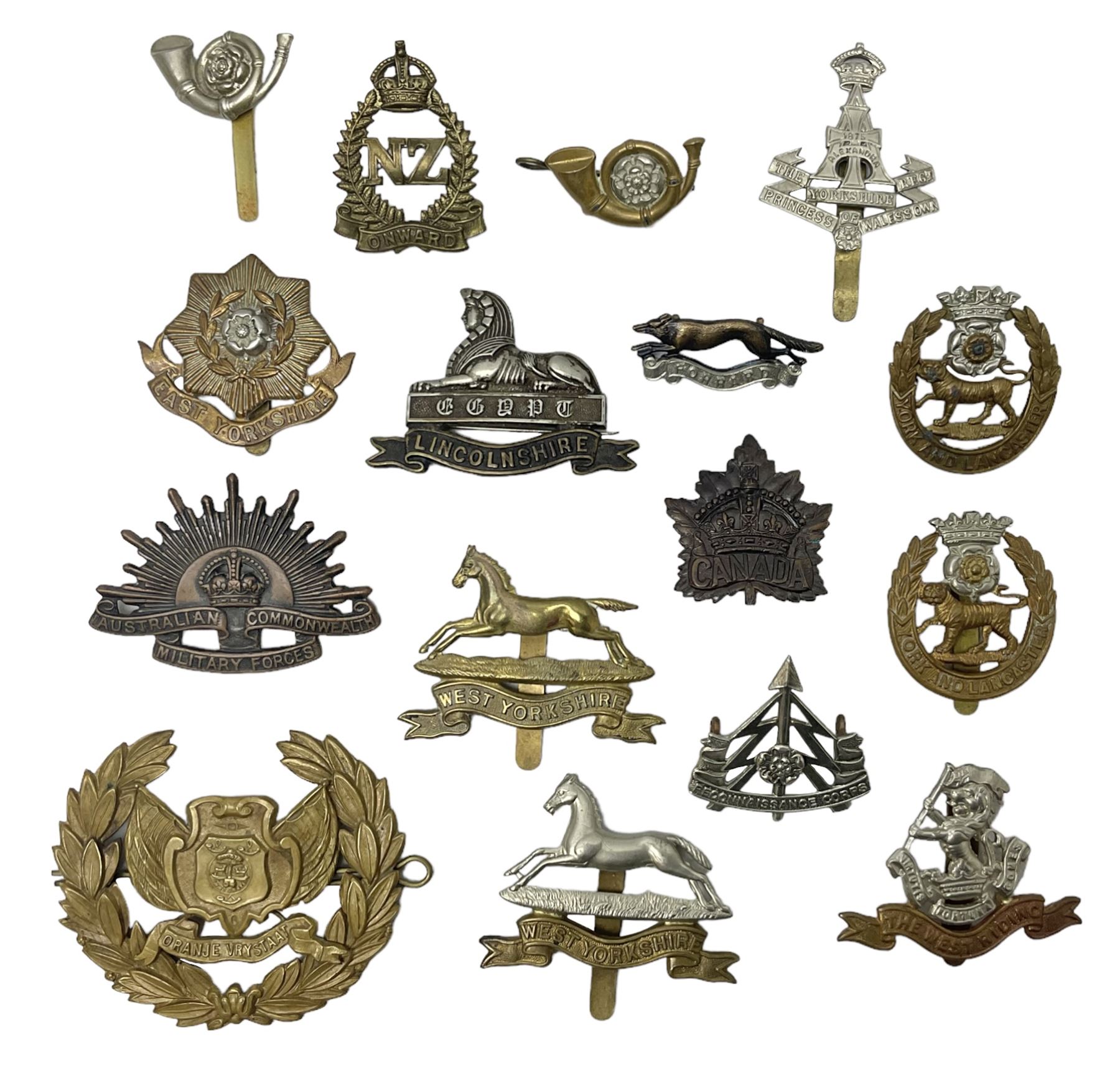 South African Army Orange Free State Artillery badge; three Commonwealth badges; and twelve Yorkshire/Lincolnshire badges including East Yorkshire, West Riding, York and Lancaster, West Yorkshire etc (16)