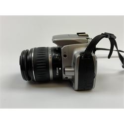 Canon EOS 350D digital camera with 'Canon Zoom Lens EF-S 18-55mm 1:3.5-5.6 II USM', with instruction manual and charger and two further lenses, Canon Ultrasonic 'Canon Zoom Lens EF 35-105mm 1:4.5-5.6' and a Canon Ultrasonic 'Canon Zoom Lens EF 75-300mm 1:4-5.6 III USM'