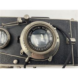 Welta Superfekta Folding twin lens camera, with 'Meyer Gorlitz Trioplan 1;3.8 f=10cm' lens serial no 649219 and 'Meyer Gorlitz Trioplan 1;3.8 f=7.5cm' lens serial no 653168, in fitted case