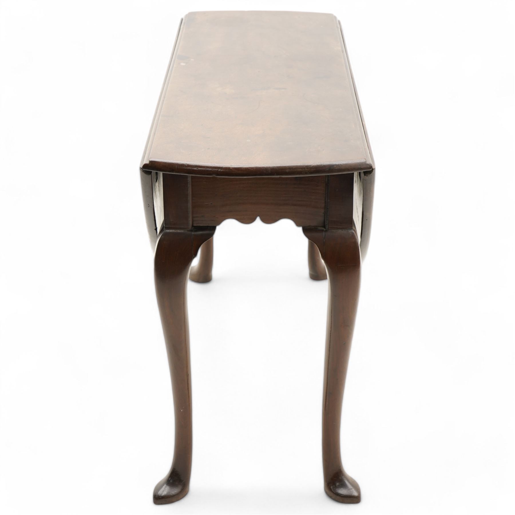 George III mahogany dining table, oval drop-leaf top on gate-leg action base, on cabriole supports with pointed pad feet