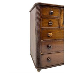Early 19th century mahogany chest, fitted with seven drawers, centre deep drawer, rounded rope twist corners 