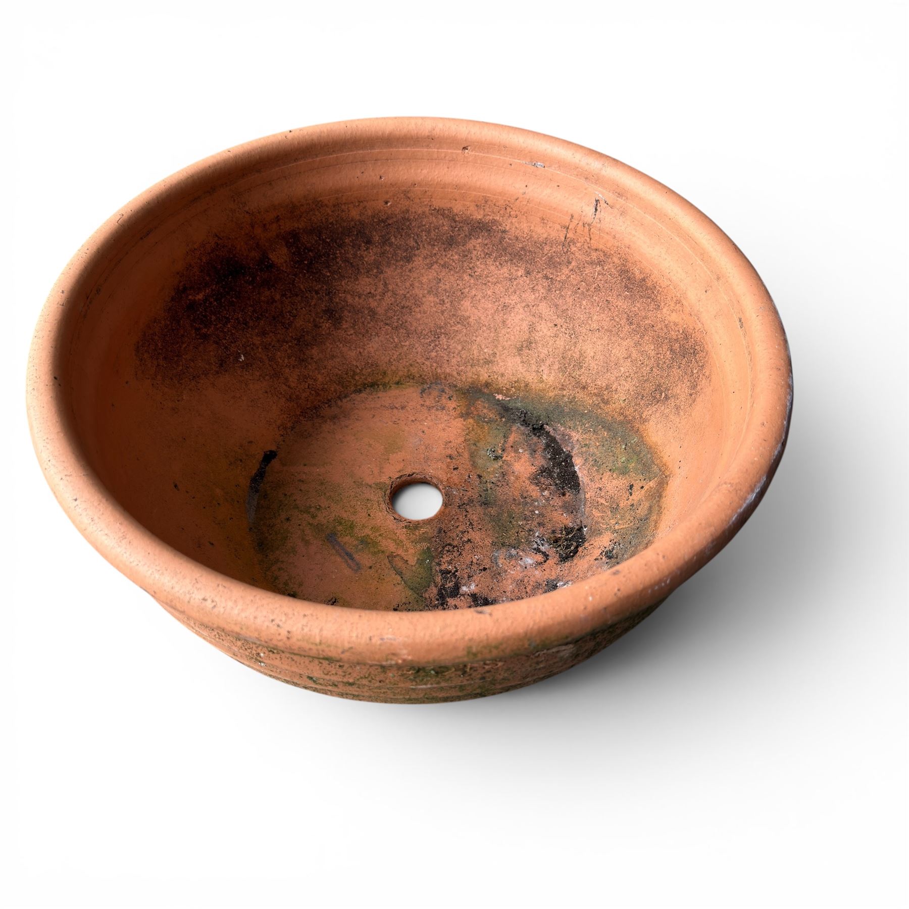 Collection of five terracotta garden planters along with rectangular sandstone trough 