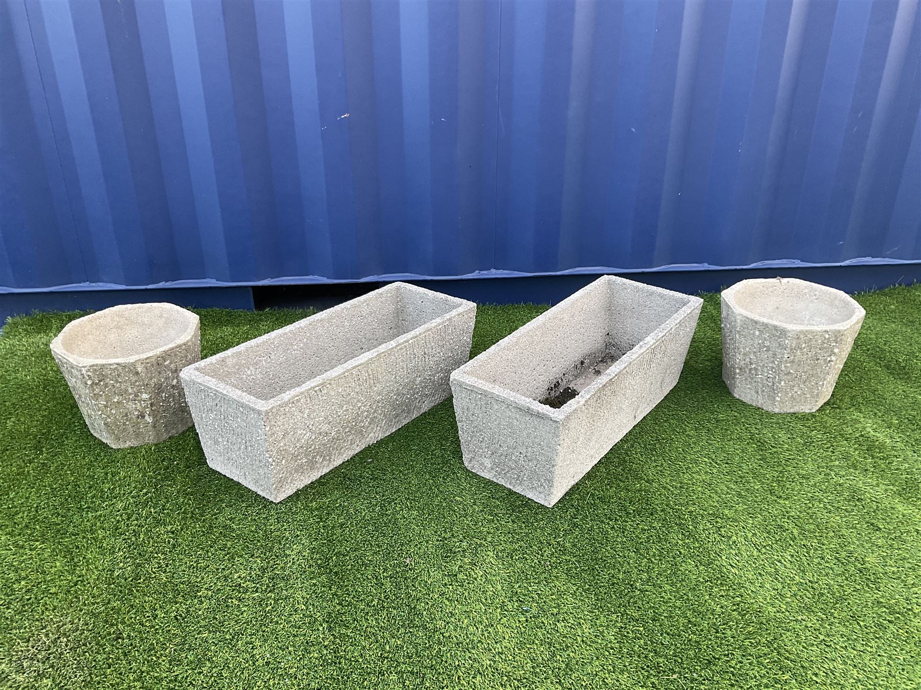 Pair of composite stone rectangular troughs and two small planters (4) - THIS LOT IS TO BE COLLECTED BY APPOINTMENT FROM DUGGLEBY STORAGE, GREAT HILL, EASTFIELD, SCARBOROUGH, YO11 3TX