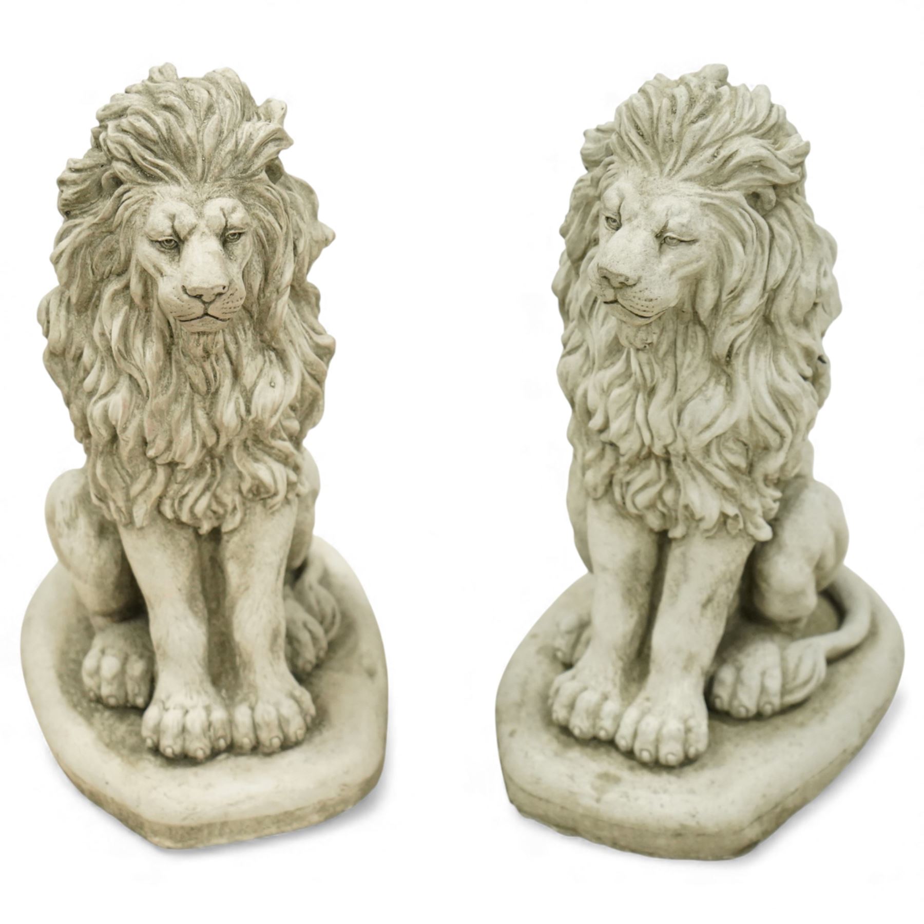 Pair of contemporary cast stone lions, seated pose on shaped plinths, with textured manes and aged surface finish