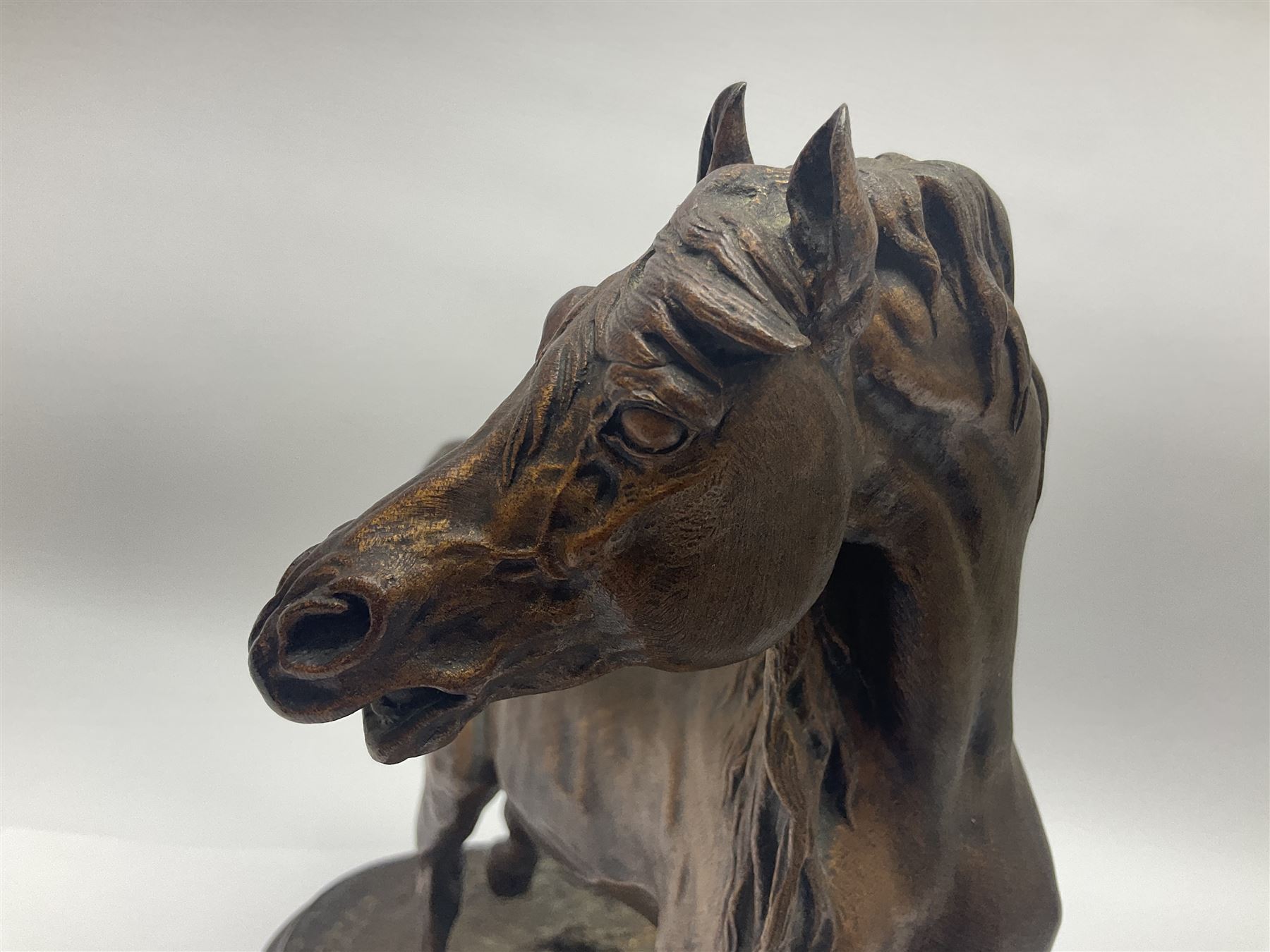 After P J Mene, bronze figure of a horse on a stepped oval base, H31cm 