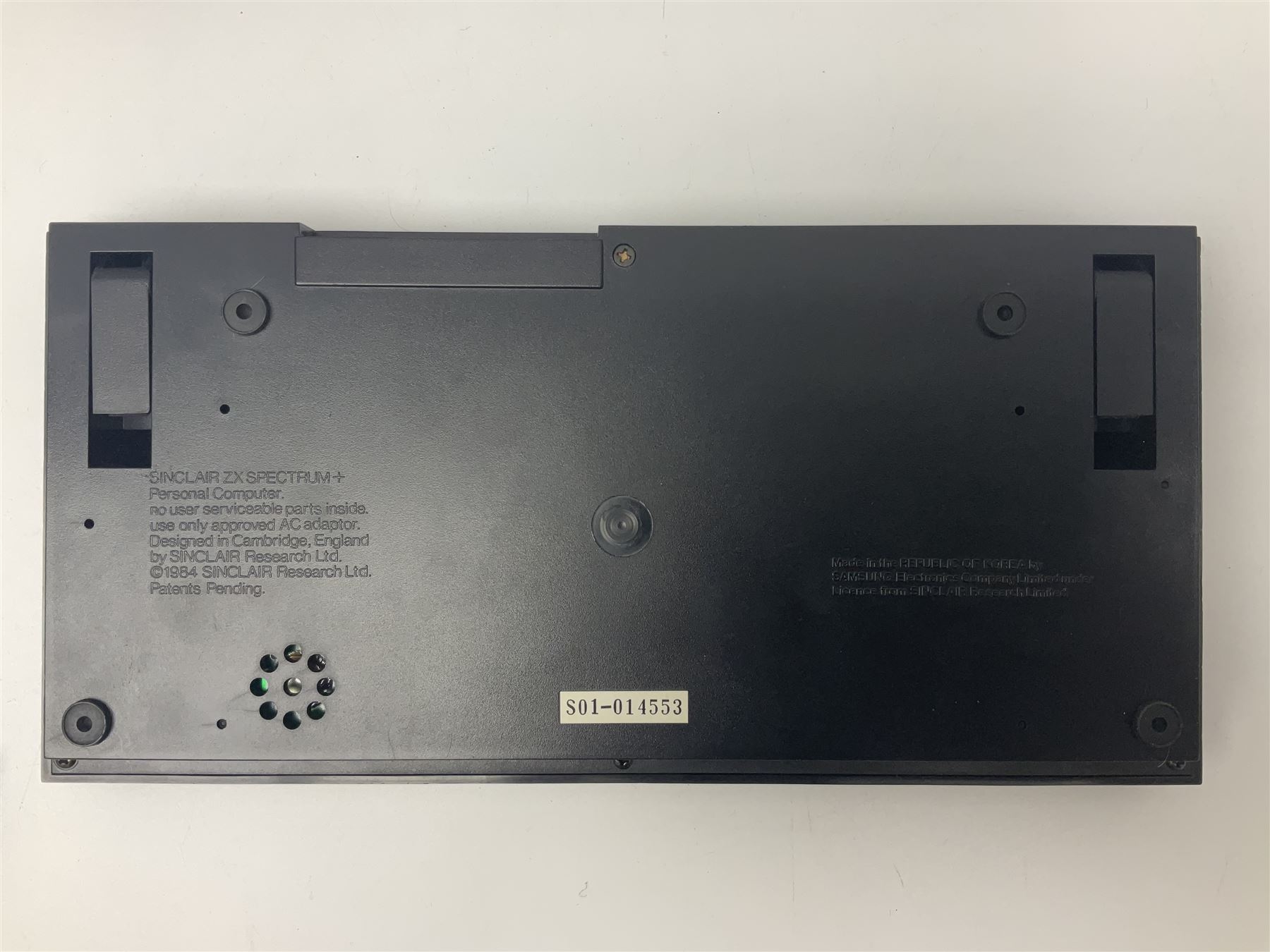 Sinclair ZX Spectrum (1984) with accessories and games; ten games for Sinclair Spectrum and 48K Spectrum to include ‘Knight Lore’, ‘The Way of the Exploding Fist’, and ‘Green Beret’ all in original boxes, ‘Rambo First Blood Part II’ without original box; Sinclair UK1400 Power Supply Unit, Hales Universal Mains Adapter, RAM Turbo Spectrum Joystick Interface, Starlite Cassette Player, all without boxes