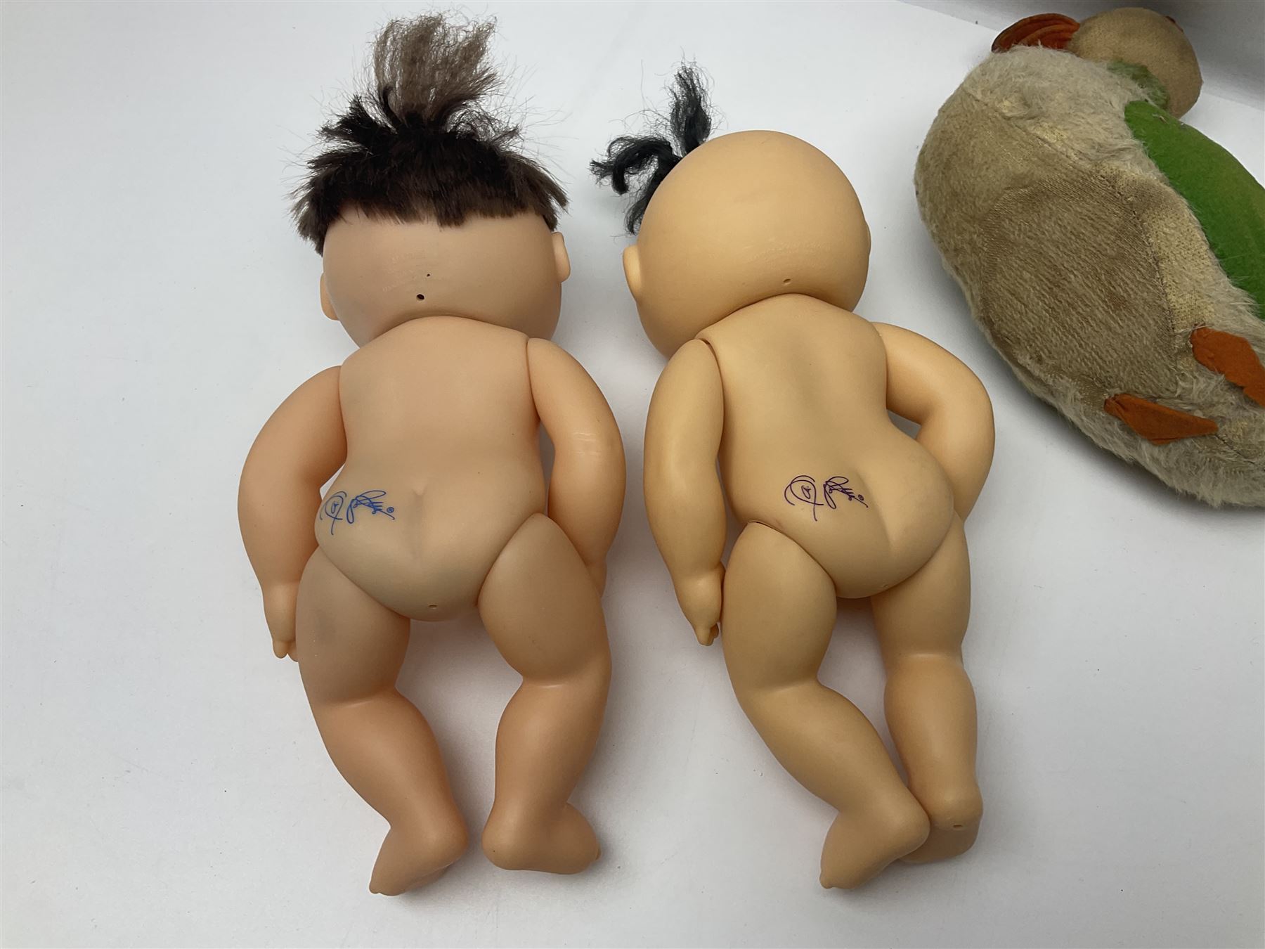 Plush covered soft toy of a swimming duck with squeeze type musical action L17cm; and collection of ten Cabbage Patch type dolls by various makers including Mattel, Hasbro, Appalachian Artworks, Migliorati etc