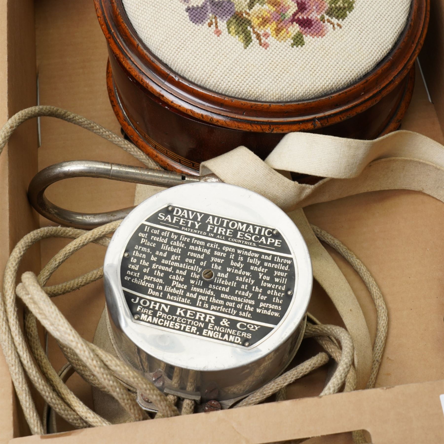 Victorian spittoon with tapestry upholstered top and treacle glazed liner, Davy Automatic Safety fire escape, pewter candlesticks, stool, classical design gilded stand