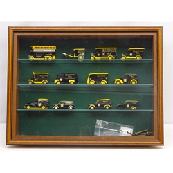  Collection of twelve die cast Lledo & Days Gone Ringtons Tea Promo. vehicle, glazed display cabinet  
