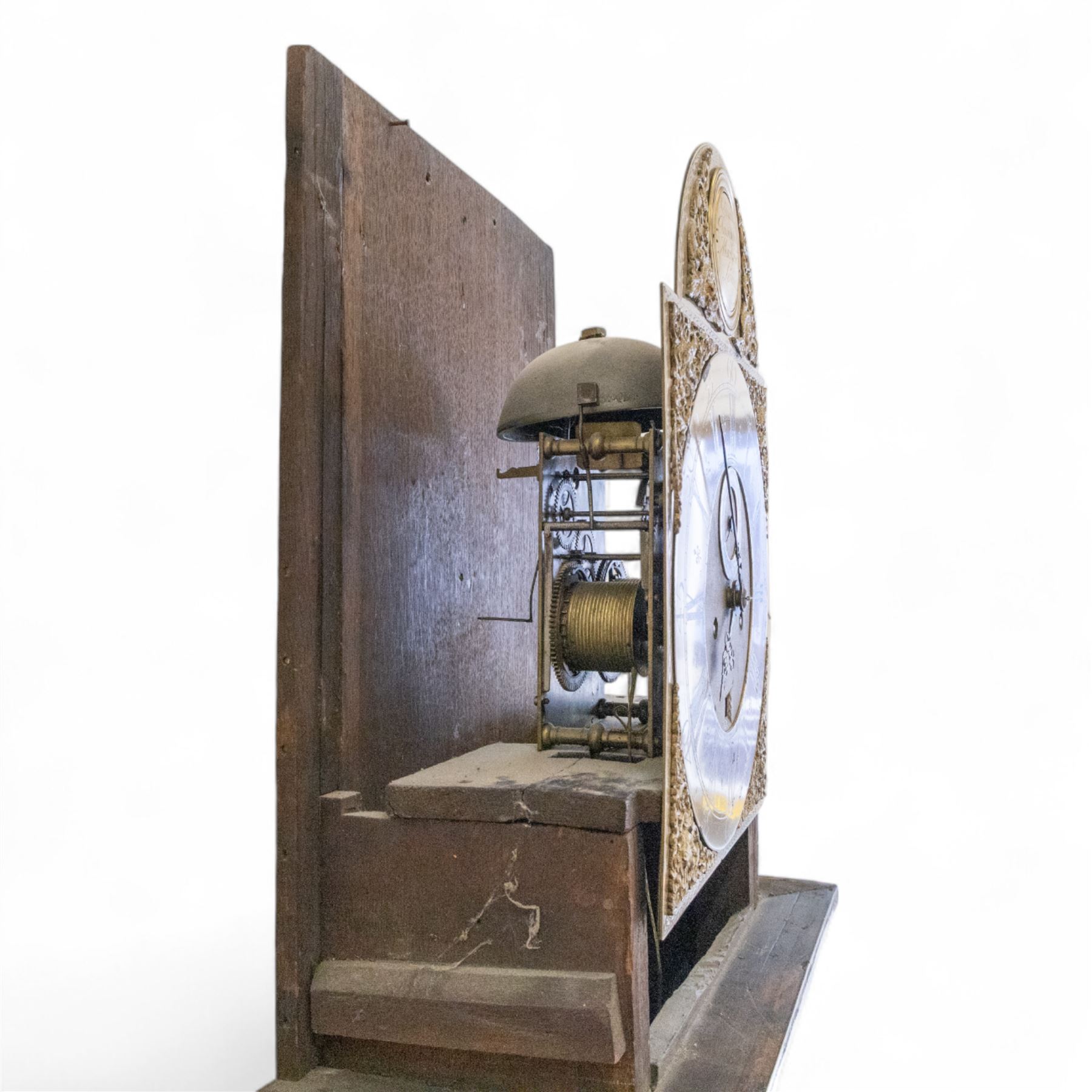 Charles Clay of The Strand & St James, London-Early 18th century 8-day walnut longcase clock c1720, with a flat caddy top (caddy missing) and blind frets beneath, later glazed panels to the sides and a break arch hood door with attached reeded pilasters, long trunk and conforming trunk door with beading to the edge, on a short plinth with attached skirting, break-arch brass dial with cast spandrels, herringbone engraving to the edge and a  silvered boss to the arch inscribed 