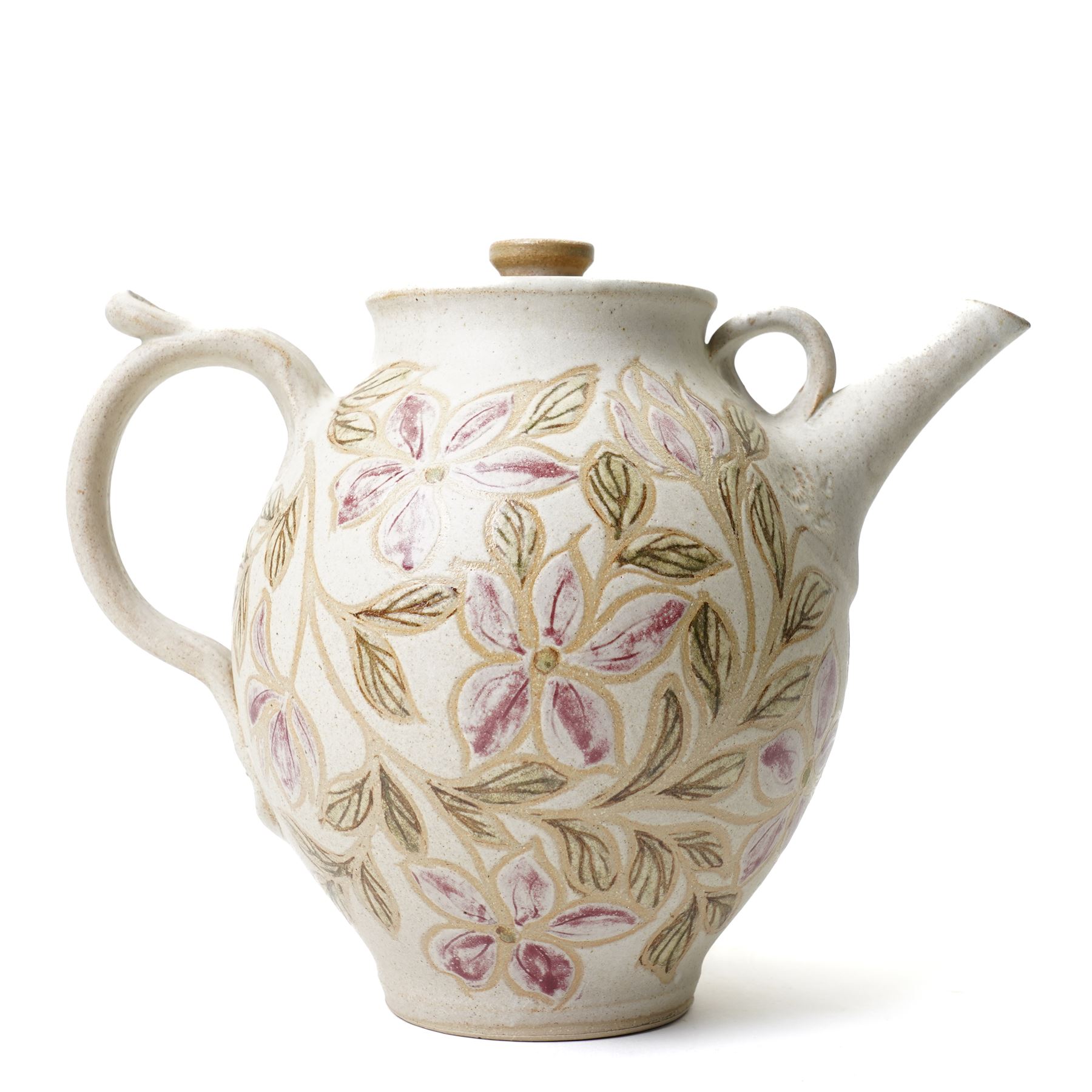 John Egerton (c1945-2024): studio pottery teapot, decorated with foliage and flowers on a cream ground, with impressed ammonites to the handle and spout, marked beneath, H28cm