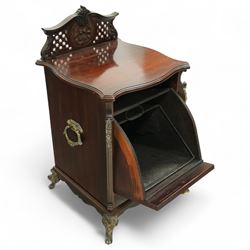Late Victorian mahogany coal purdonium, the serpentine front door carved with scrolling foliage, surmounted by a pierced and foliate crest, brass carrying handles to sides, gilt metal mounts and cabriole legs