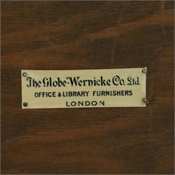 Globe Wernicke - early 20th century three sectional stacking library bookcase, two glazed sections above a panelled section, on a plinth base with inbuilt drawer