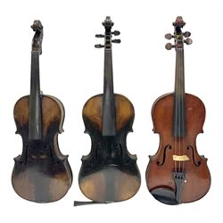 German violin c1890 with 36cm two-piece maple back and ribs and spruce top; bears label 'Antonius Stradivarius Cremona Faciebat Anno 1729' L59.5cm overall; in ebonised wooden 'coffin' case; and two German violins c1890 for completion - one bearing a Stradivarius label, the other a Ruggeri label; both in carrying cases (3)