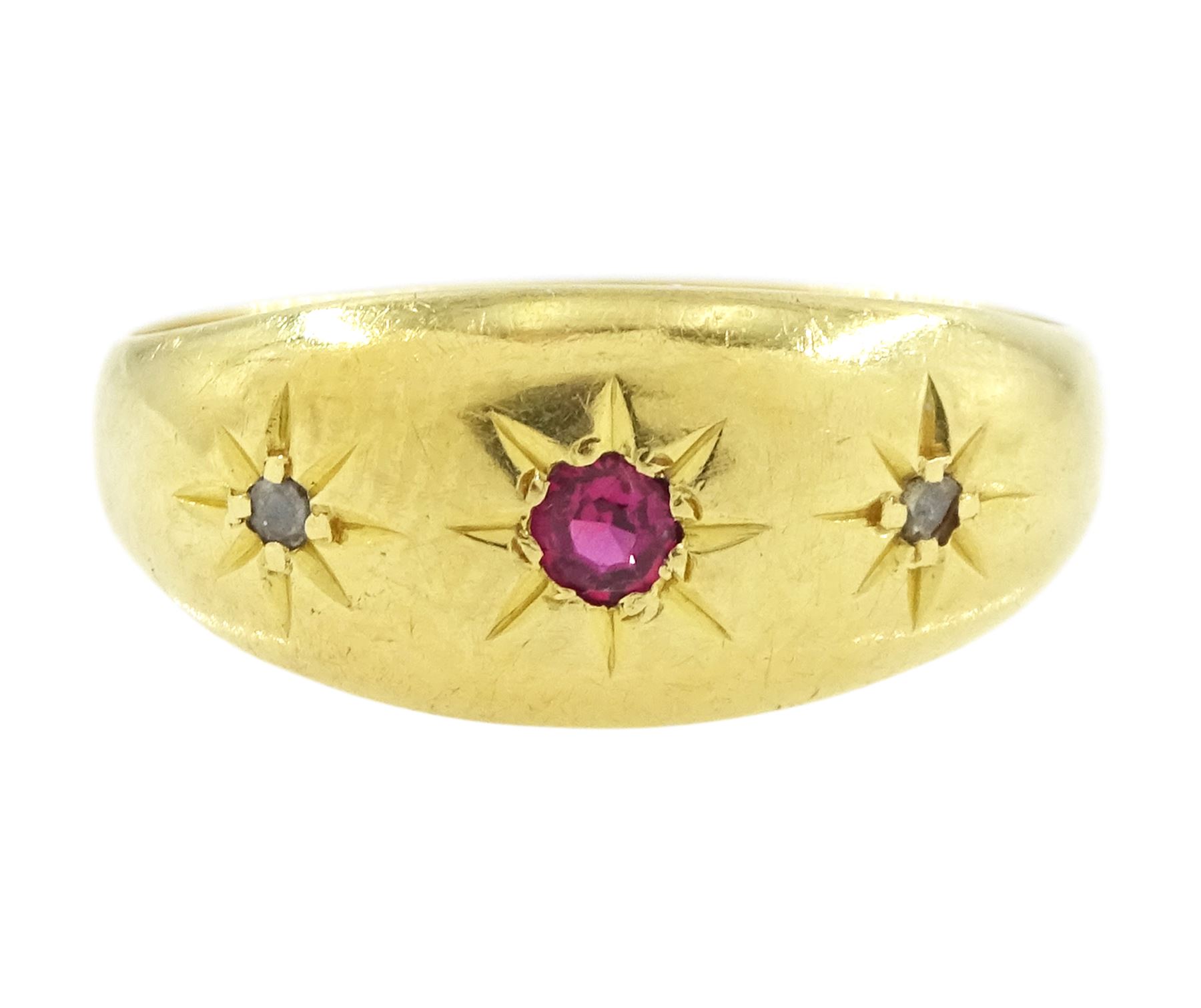 Early 20th century 18ct gold ruby and diamond gypsy ring, single round cut ruby with a rose cut diamond set either side, Chester 1919
