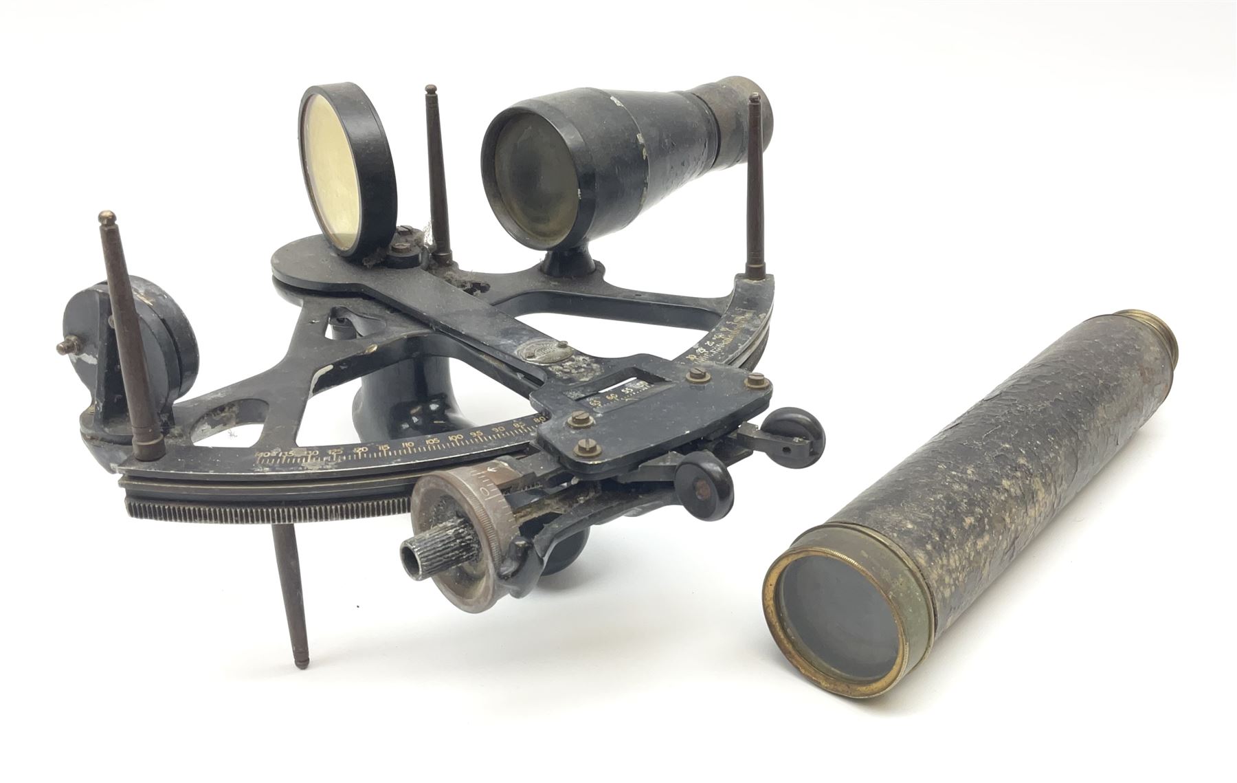 Henry Hughes & Son 'Husun' black finished brass sextant marked H (broad arrow) O No.287 W29cm; and a 19th century Harris & Son London brass three-draw telescope with leather covered tube L72cm extended (2)