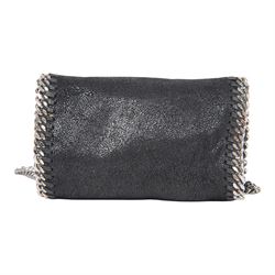 Stella McCartney Falabella black shaggy deer cross-body bag, the compact foldover design with signature silver-tone curb chain trim and chain strap, logo disc charm and pink logo lining, stamped Stella McCartney Made in Italy, with dust bag