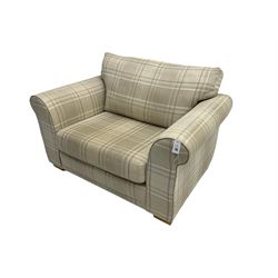 Contemporary snuggler sofa, upholstered in chequered fabric