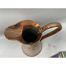 Copper crocodile skin effect jug, together with a collection of postcards including a silk example, jug H29cm
