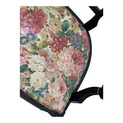 Edwardian mahogany three seater settee, upholstered in floral fabric. Shield back with padded armrests and cabriole legs  