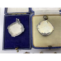 Four St John's silver fobs, together with two silver Directors Ambulance shield fobs and two other St Johns items 