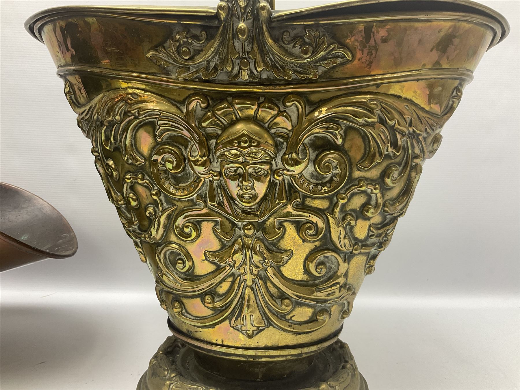 Victorian Benham & Froud Arts and Crafts brass coal scuttle, with Victorian diamond registration mark, together with a copper and brass scuttle of helmet form, tallest H50cm