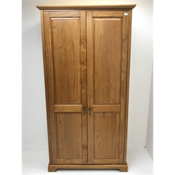 Marks and Spencer cherry double wardrobe, projecting cornice, two doors enclosing single shelf and hanging rail, shaped plinth base, W103cm, H196cm, D60cm 