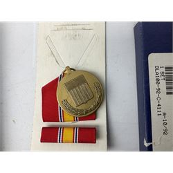Nine American medals including WW2 Navy and Army Occupation medals, 1939-41 Defence Medal, boxed National Defence Medal and bar, South West Asia Service with bar, Air Force, National Guard and Military achievement medals etc (9)