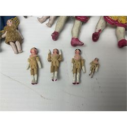 Twelve miniature bisque, bisque headed and wooden dolls to include articulated examples, tallest 12cm 