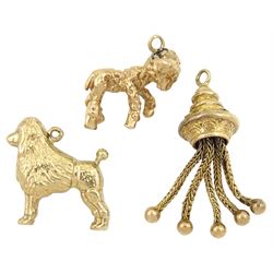 Three 9ct gold pendant/charms including poodle, lamb and tassel