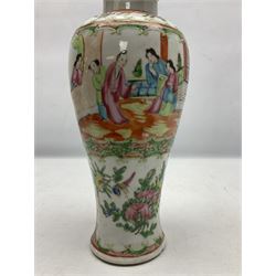 19th century Cantonese Famille Rose vase of slender baluster form, decorated with typical panels of birds and flowers alternating with figures, the cover with gilt dog of Fo finial,  with blue four character mark beneath, H33cm