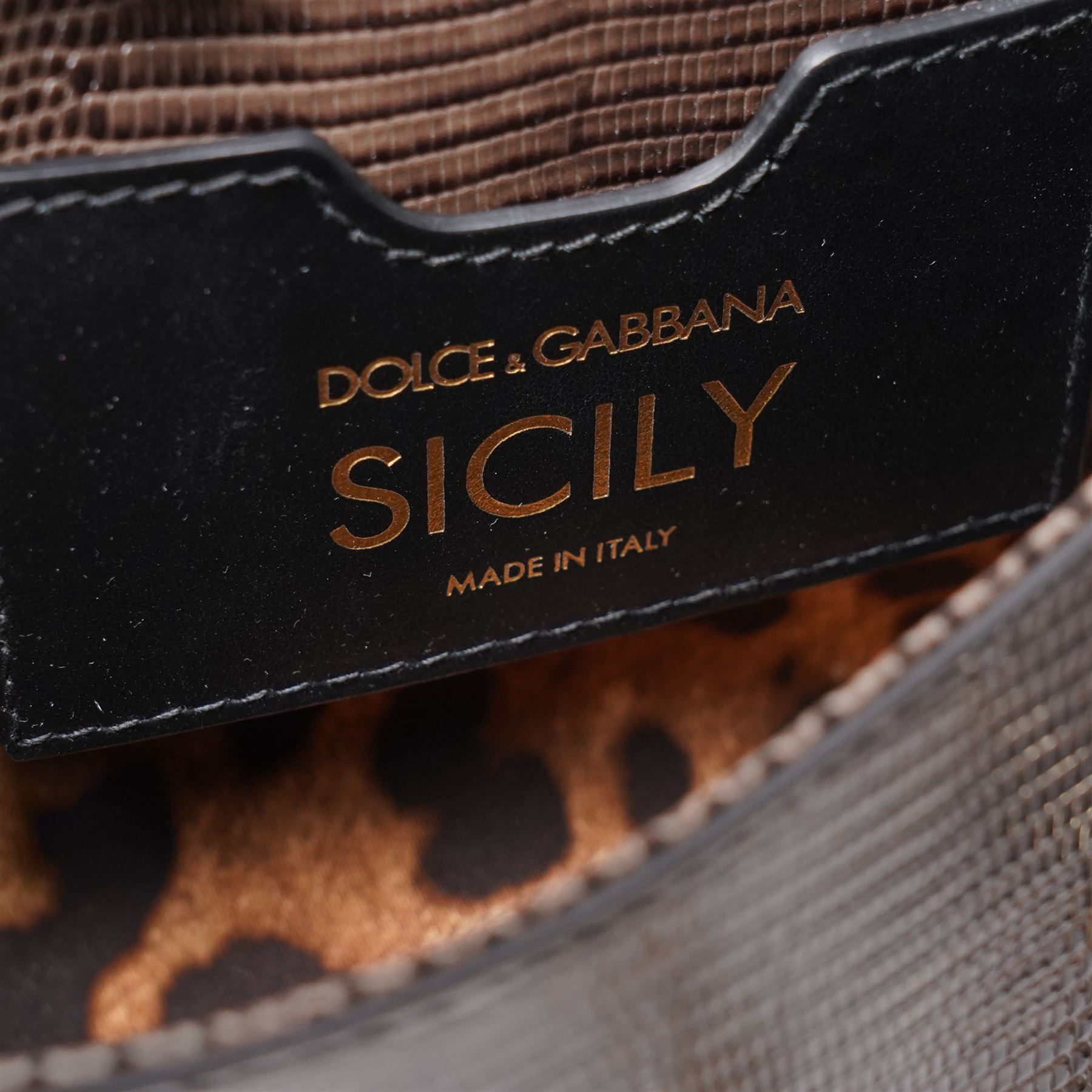 Dolce & Gabbana - ‘Miss Sicily’ Jewelled Mini Shoulder Bag, the model introduced for the Fall/Winter 2017/2018 collection, in structured brown iguana-print calfskin leather, the front applied with a multicoloured crystal-set DG monogram logo incorporating floral motif, with detachable gold-tone chain shoulder strap, unused with original dust bag and tags