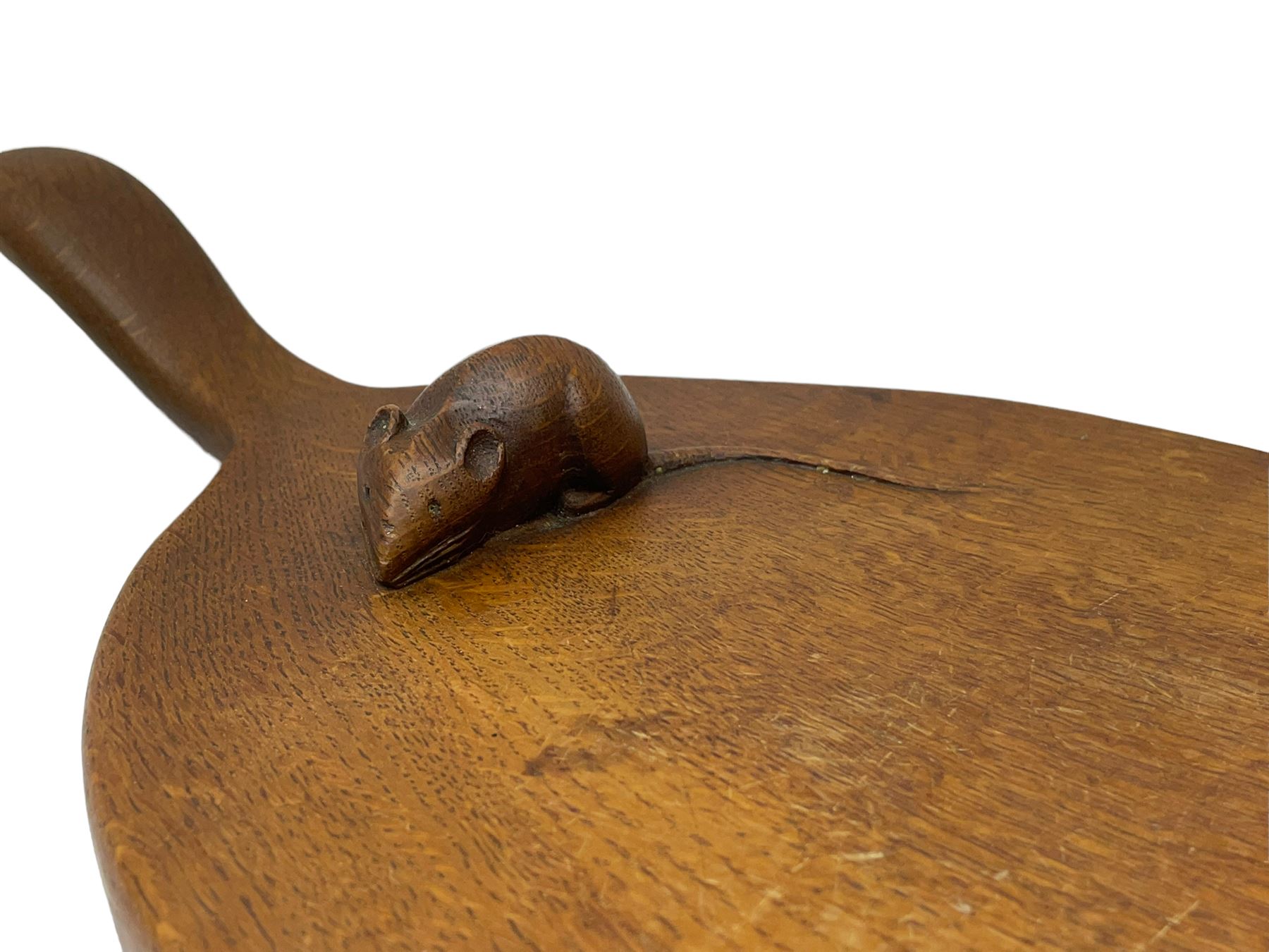 Mouseman - circa. 1940s/50s adzed oak cheese board, oval form with handle, the board carved with mouse signature, by Robert Thompson of Kilburn, L37cm D18cm 