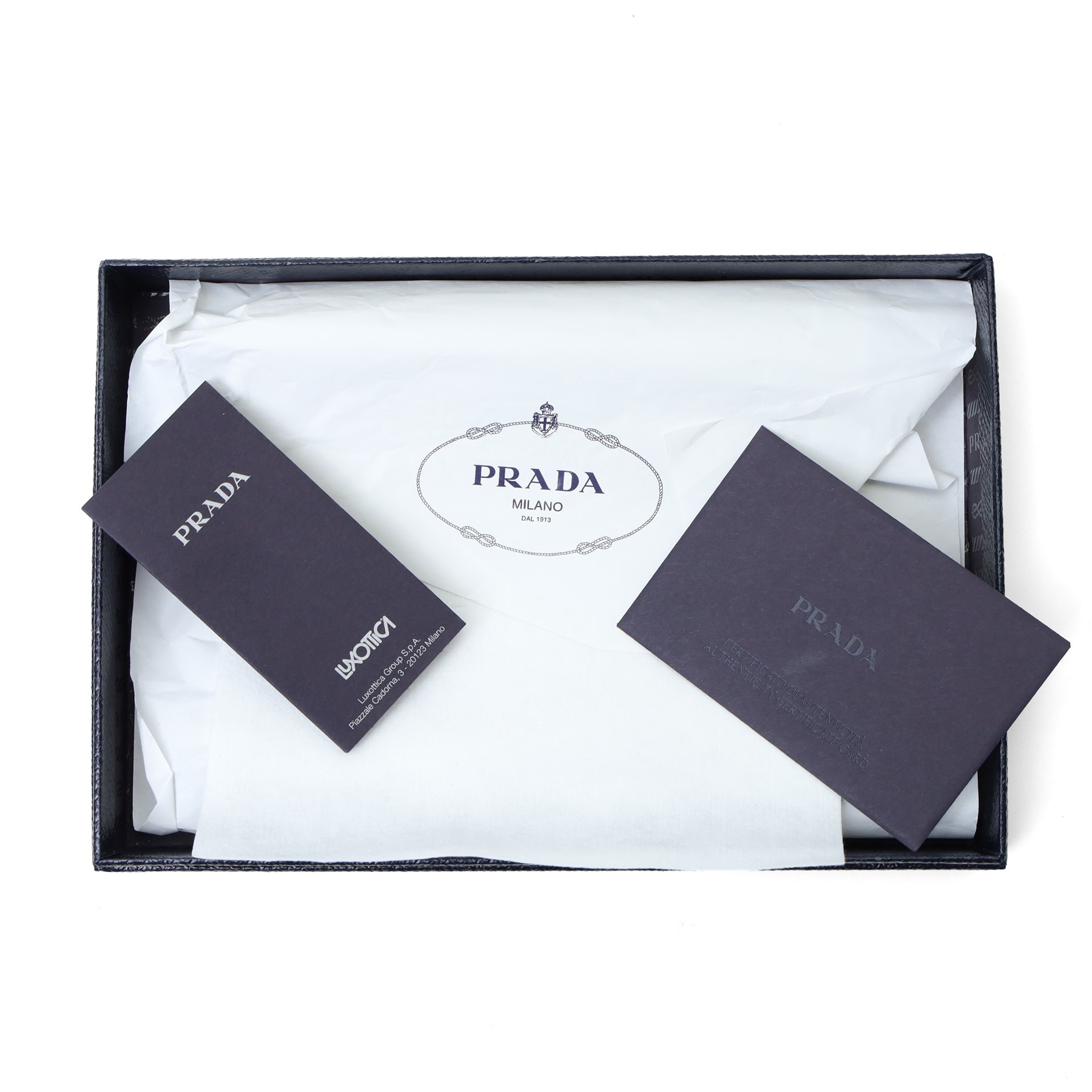 Prada - Saffiano Metal zip-around wallet, black Saffiano leather with gold-tone hardware and applied logo plaque, zip-around fastening with wrist strap and fitted interior, with authenticity card and original box
