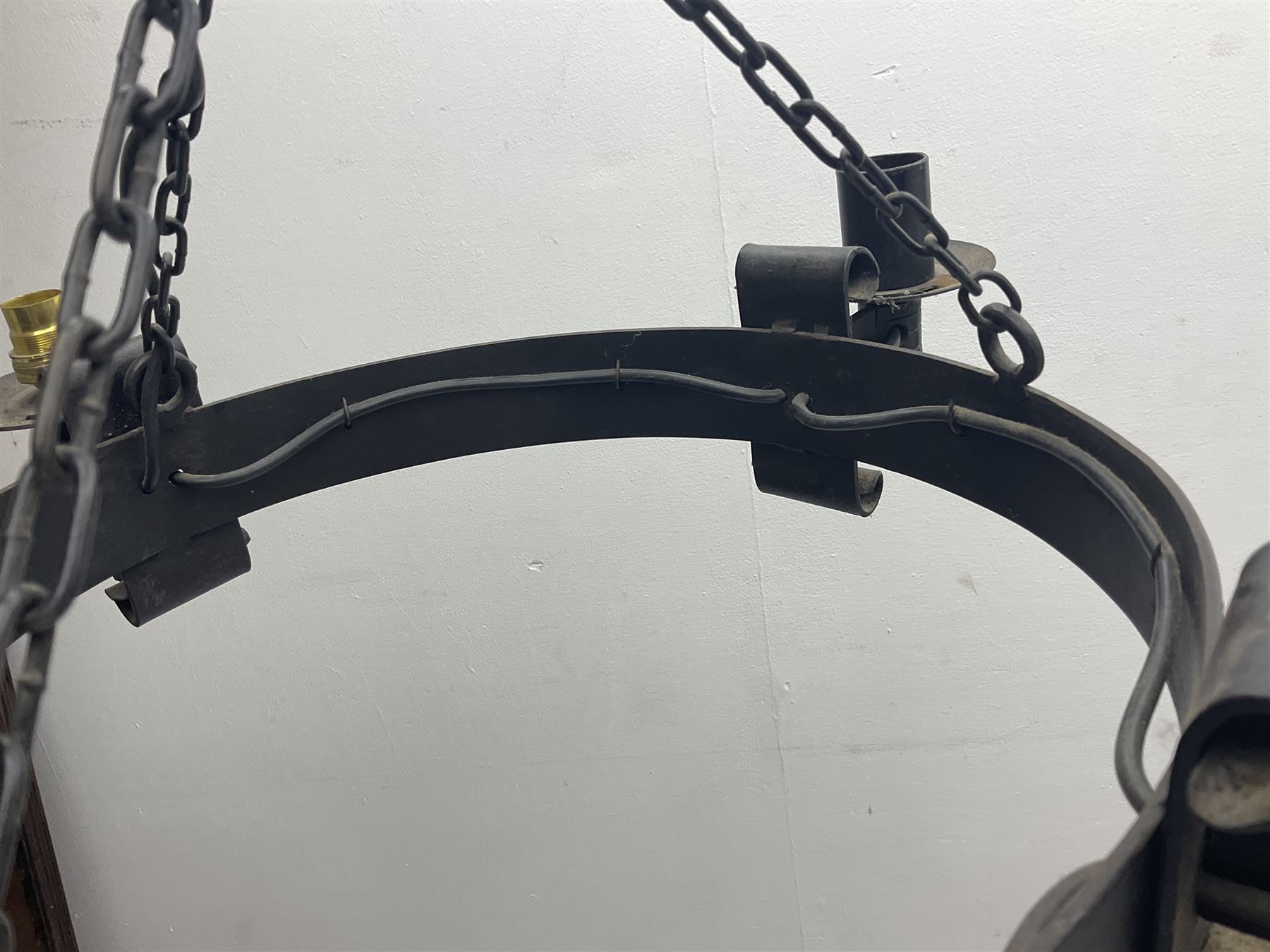 Pair of gothic style wrought iron ceiling lights, each with four branches, D58cm